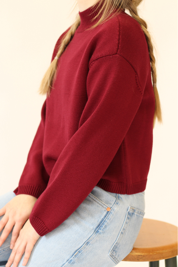 red mockneck sweater